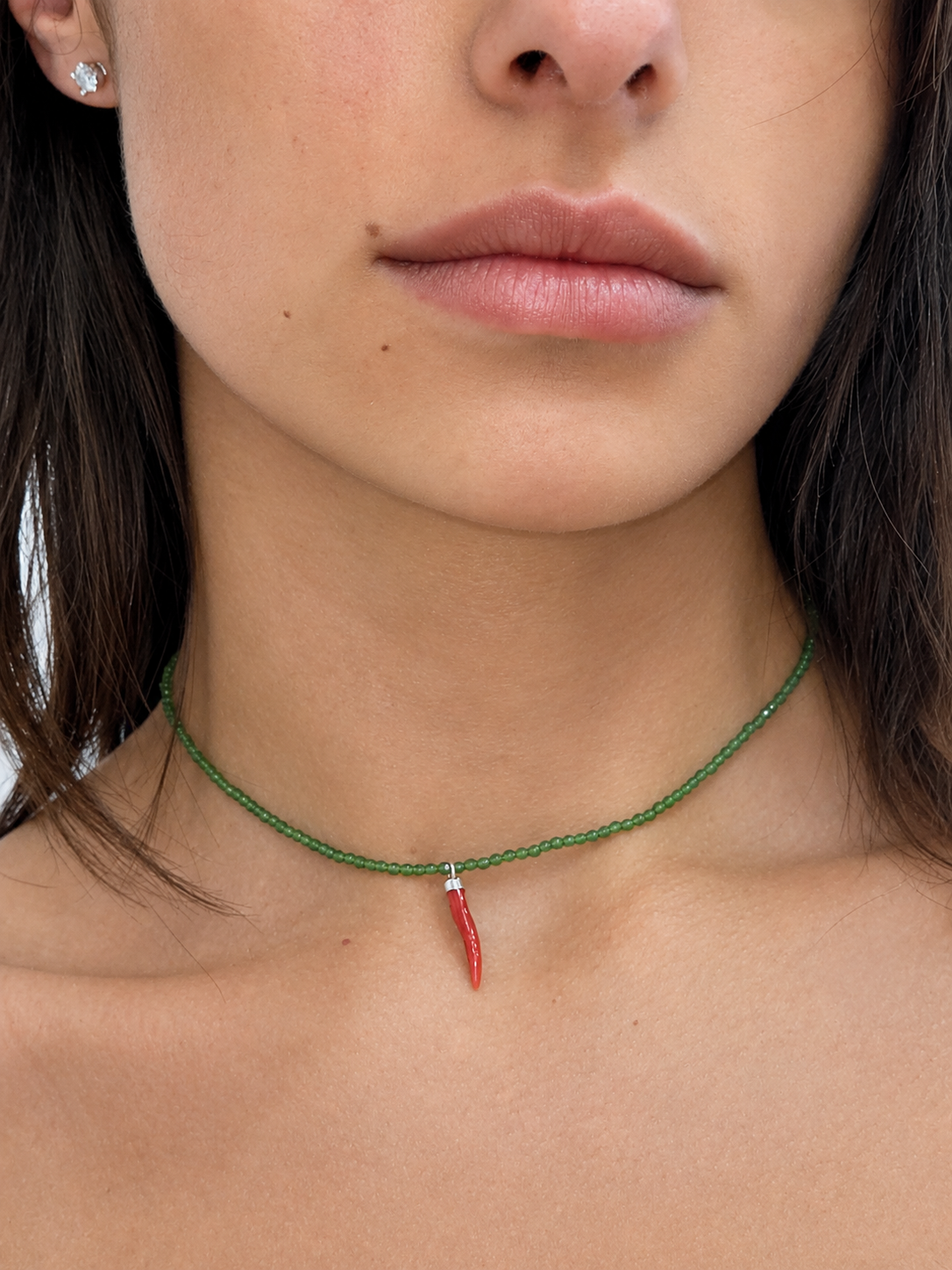 Collana con Cristalli di Giada Faccetta in Argento 925 con  Cornetto Portafortuna di Corallo rosso